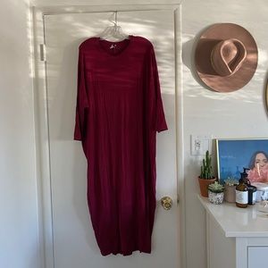 Long red midi dress, tighter around the calves!